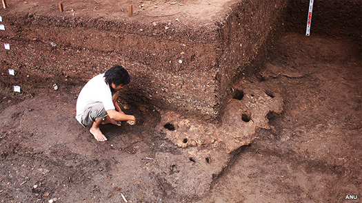 Archaeologists work at the Rach Nui site in Vietnam
